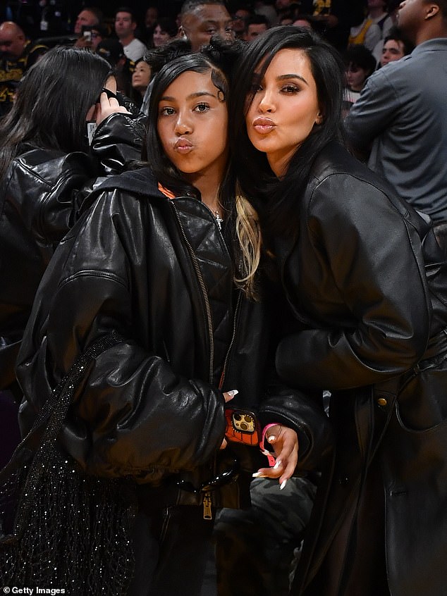 While Kardashian did not address the backlash at the time, she explained she's 'still learning' as a mother and that North was experimenting with her style to look like her friends; seen last year