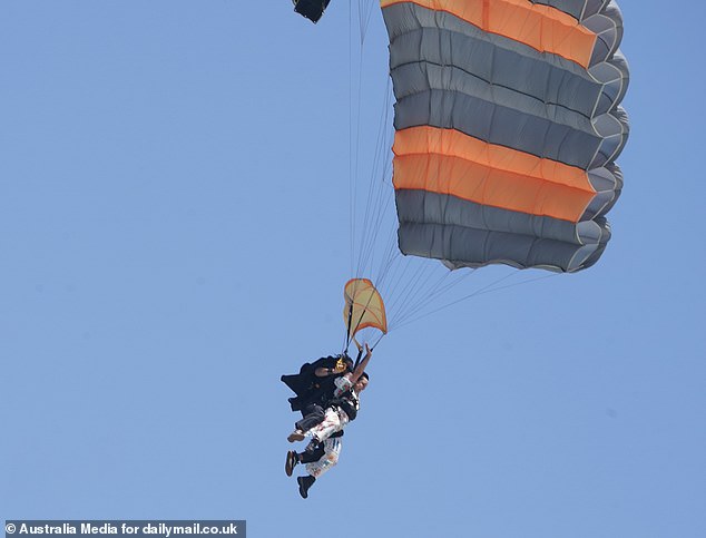 Shona was snapped flying through the air in her parachute as she successfully completed her first challenge on the programme