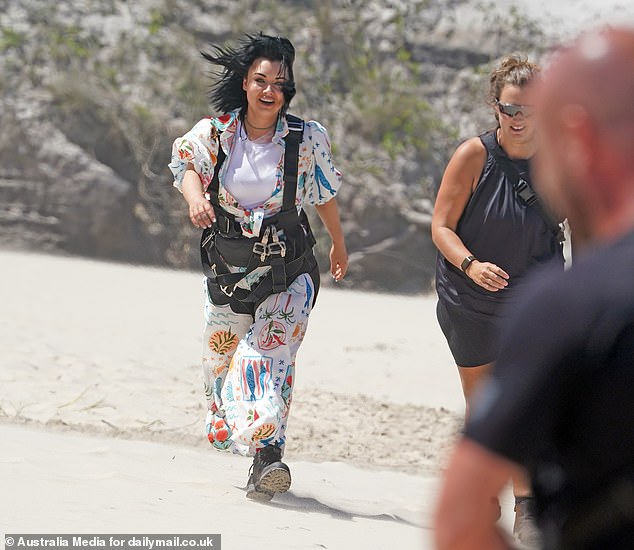 Shona was sporting a printed playsuit with her harness