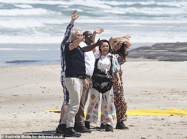 They waved to Ant and Dec from down on the beach