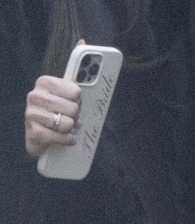 Her excitement for her upcoming nuptials were clear in her choice of accessory, as she brandished the phone case adorned with her imminent status