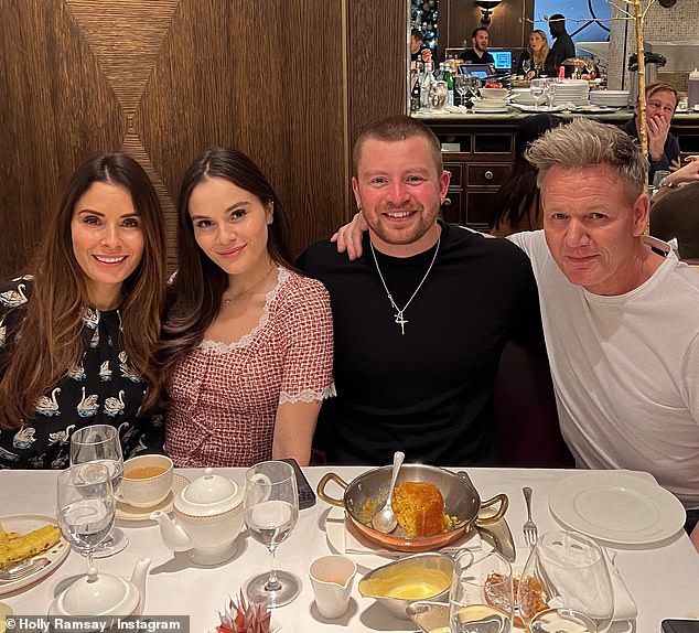 Adam is seen with Holly and her parents Gordon and Tana