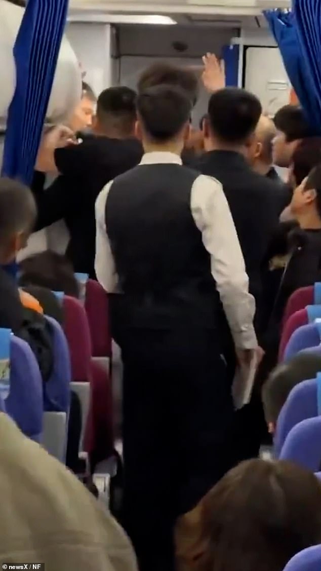 A woman's voice can be heard angrily shouting after she was reportedly asked to disembark, according to The Sun