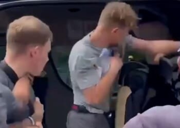 Shocking moment Brit tourist brawls with fellow traveller after 'man put his bare feet against his headrest'