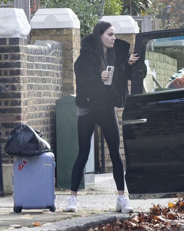 She stepped out in south-west London while clutching a £2,880 Louis Vuitton holdall shortly after the couple gave an ill-timed insight into their wedding planning, in the wake of uninviting his relatives