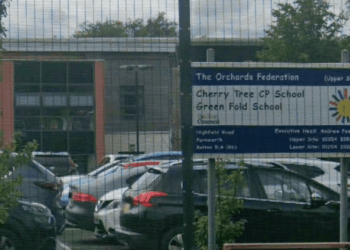 School staff member on her second day arrested for voyeurism after 'filming a child' as parents left fuming