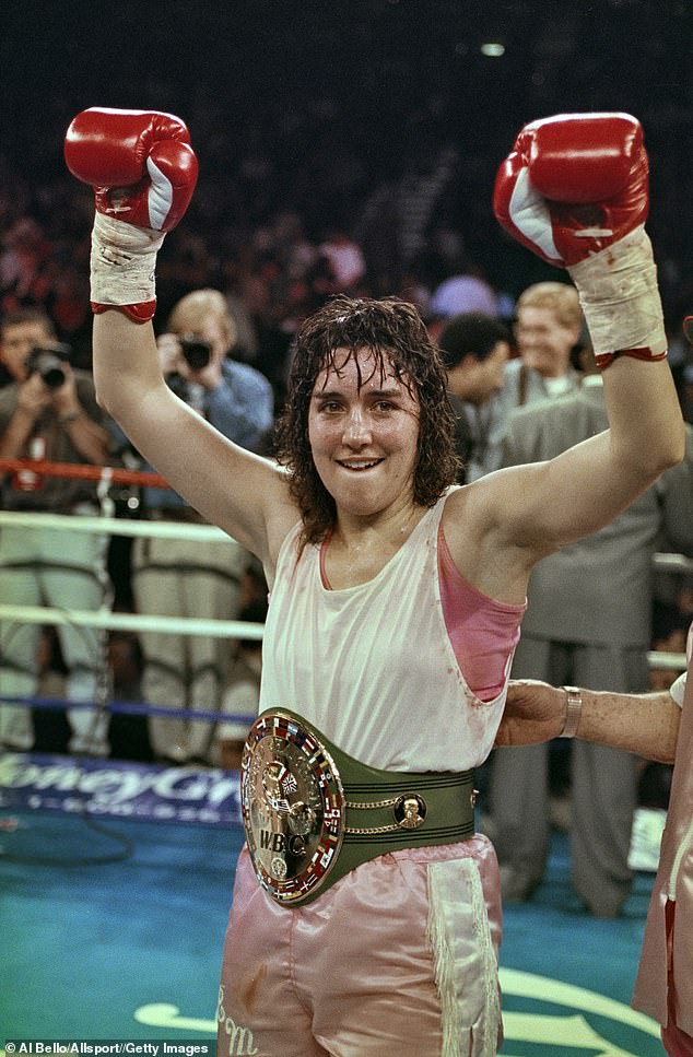 The retired athlete - who scored 49 wins, seven losses, and three draws with 31 wins by knockout - famously appeared on the cover of Sports Illustrated, which declared her 'The Lady Is a Champ' in 1996 (pictured)