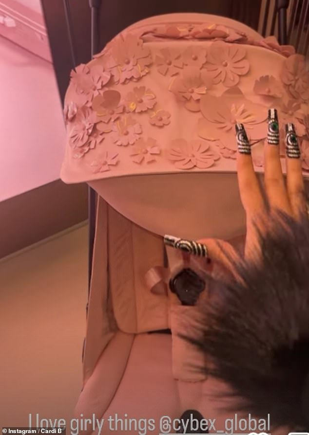 Cardi B also jumped to her own Instagram stories on Thursday as she shared a short reel of a pink baby stroller that had floral details on top