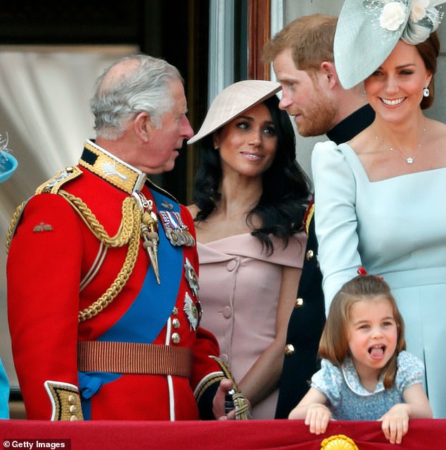 At the time, it was reported that the newlyweds, along with Charles and Camilla, went for long walks, enjoyed 'good food and quality family time' at the Queen Mother 's beloved former Scottish residence.  Prince Harry and Meghan with King Charles (left) during Trooping the Colour in June 2018 - with then-Duchess of Cambridge (right) with her daughter, Princess Charlotte