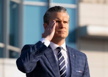 Secretary of Defense Pete Hegseth salutes as he inspects a guard of honor in Seoul, South Korea on Nov. 4, 2025.