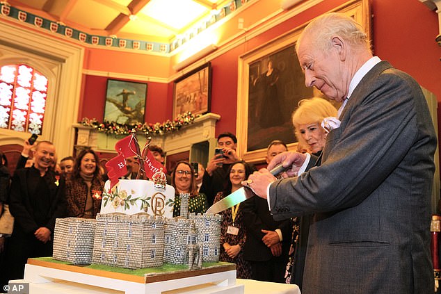The King, meanwhile, looked delighted as he celebrated his birthday in style by cutting a giant cake at the castle
