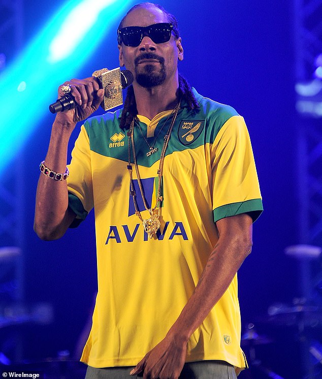 Is there a game happening today? We get you’re a fan, but it’s fancy dress and Halloween has passed. Pictured: Snoop Dogg in a Norwich City top at Radio 1's Big Weekend