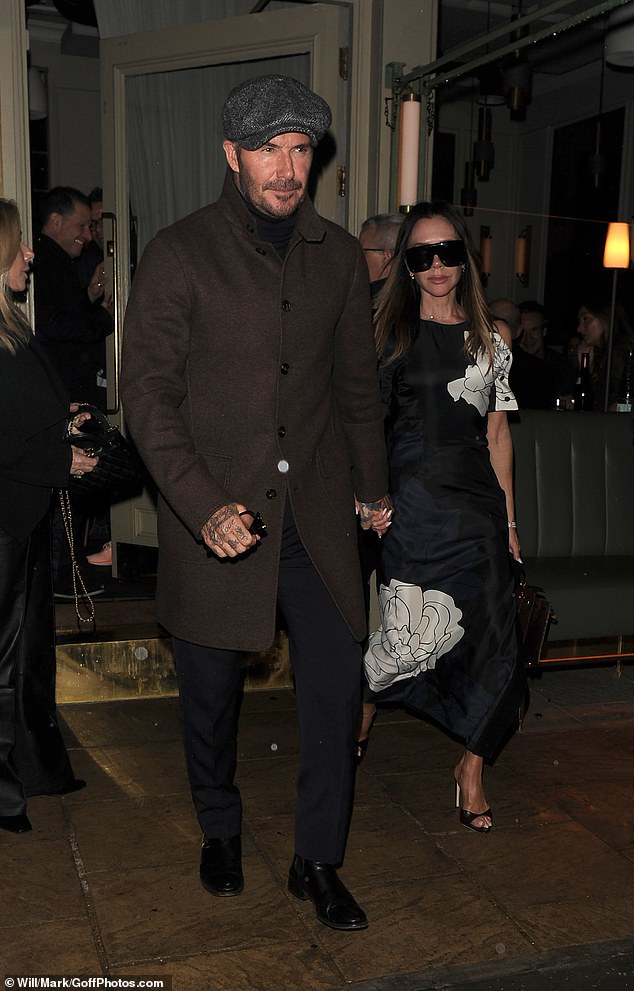 Opting for a chocolate brown wool coat and his trademark Baker Boy cap, the former Manchester United and England footballer looked typically stylish