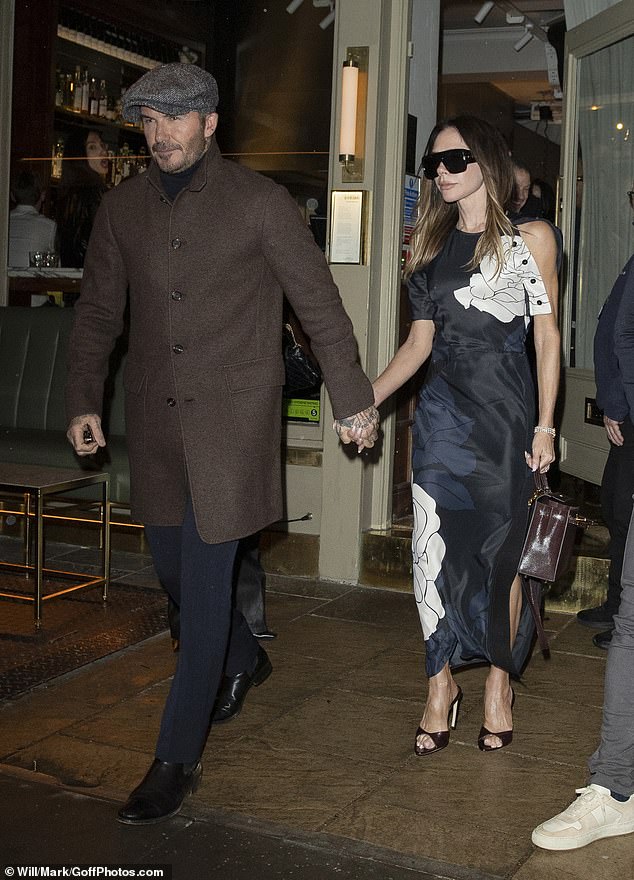 They appeared in good spirits as they left the celeb hotspot