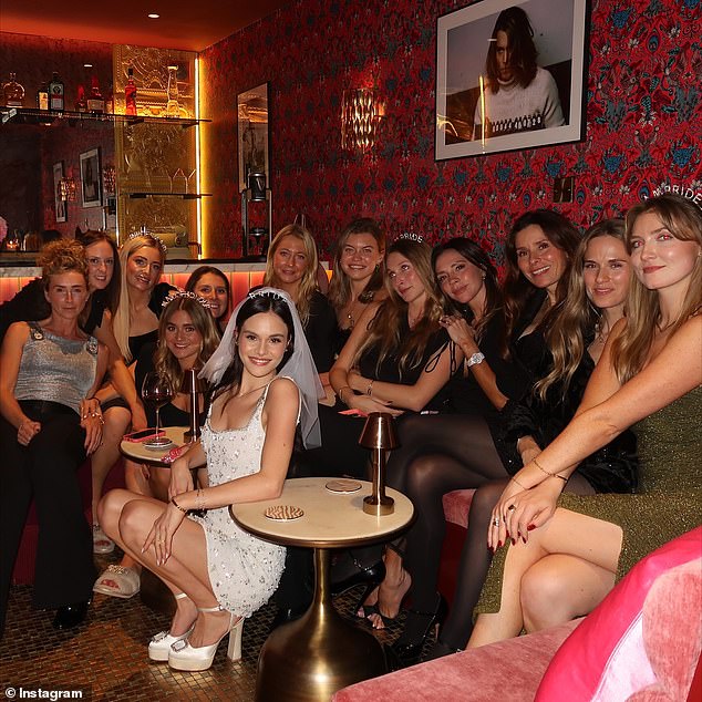 Holly is pictured at her hen do at Soho Farmhouse with her mother and Victoria Beckham among the guests