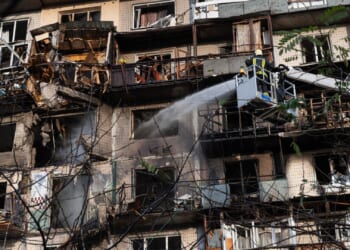 Russia hammers Kyiv with hundreds of drones killing six and injuring dozens as apartment building is hit directly