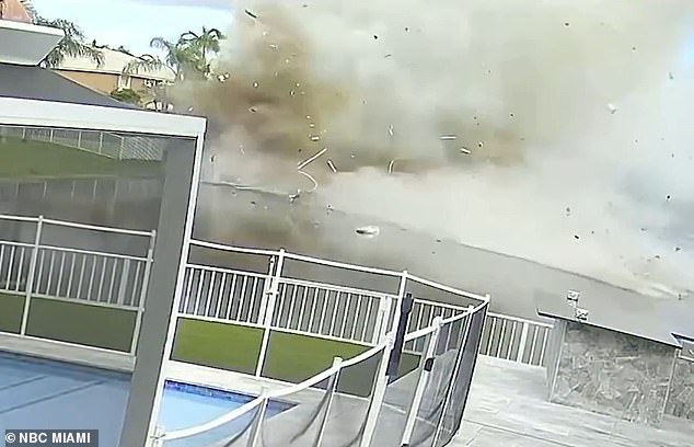 The moment the plane smashed into a pond and shattered into debris is seen in video footage
