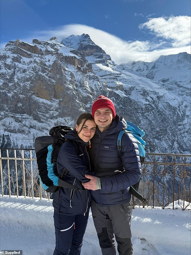 A rescue helicopter was unable to reach the site, forcing his girlfriend and five bystanders he'd met that day to carry him down the mountain for six gruelling hours ¿ with one of them persisting despite severe cramps. Pictured: Kirill and his girlfriend Daniela