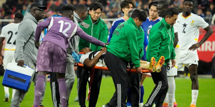 Ghana star suffers horrific broken leg injury and screams in agony during Japan friendly as 'World Cup dream over'