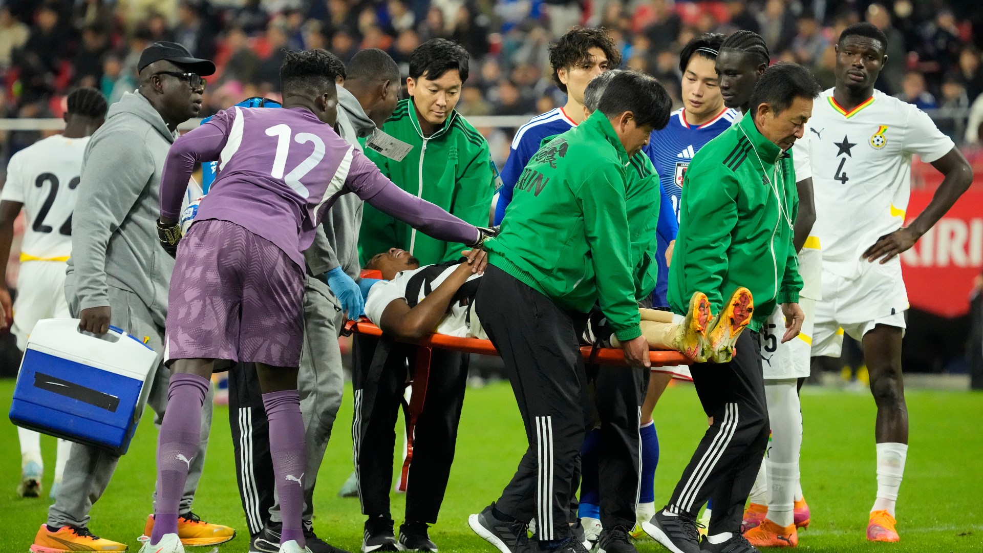 Ghana star suffers horrific broken leg injury and screams in agony during Japan friendly as 'World Cup dream over'