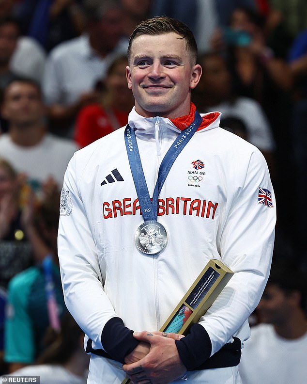 Adam Peaty boasts three Olympic gold medals, eight world titles, and a string of world records in the 50m and 100m breaststroke events. Pictured, at the 100m breaststroke medal ceremony at the 2024 Paris Olympics