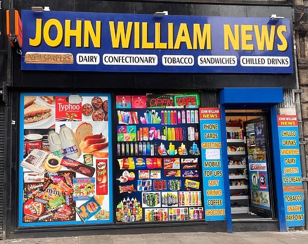 We visited 20 premises linked to Shaxawan's criminal empire and found the majority were staffed by men who identified themselves as either Kurdish, Iranian or Iraqi. Pictured: One of the shops we visited, John Williams News, in the centre of Huddersfield, West Yorkshire