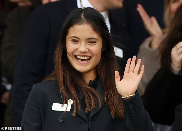 Sporty Emma sported a natural look with minimal make-up, a chic coat and her long brown tresses flowing freely while she eagerly backed the English squad