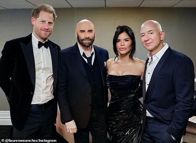 Pictured: Prince Harry alongside Lauren Sanchez, Jeff Bezos and John Travolta