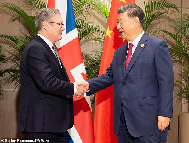 Sir Keir Starmer, pictured with Chinese President Xi Jinping last year, has been accused of striking a secret deal with Beijing to approve a new Chinese 'super-embassy