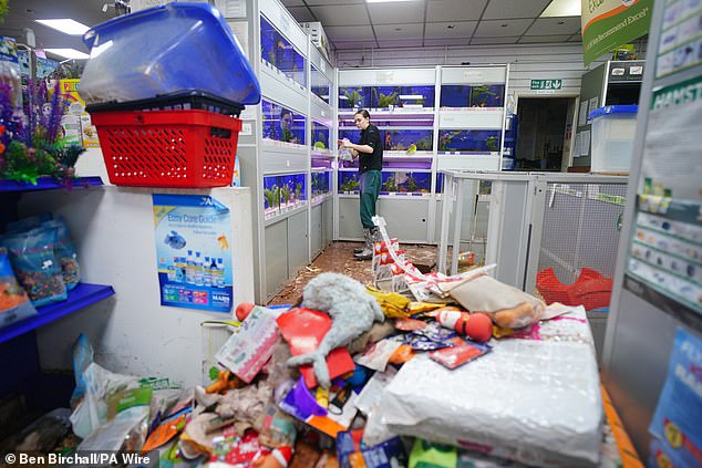 Flood damage in Monmouth in south-east Wales, after dozens of people were rescued from their homes or evacuated in the town