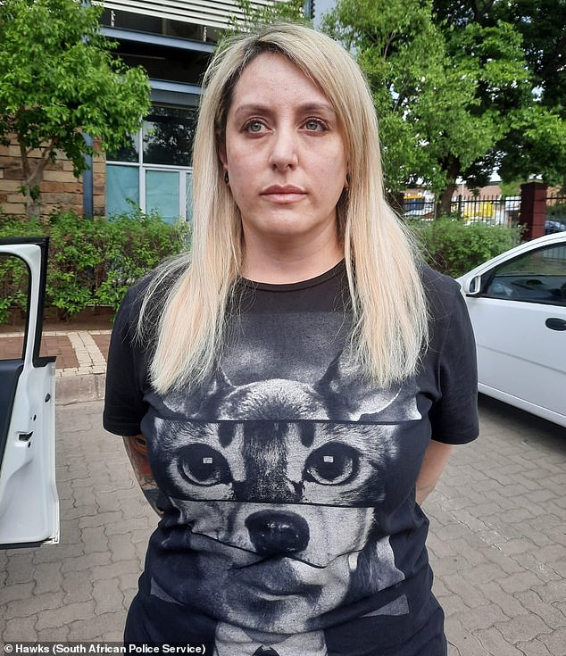 Few knew that the kind-hearted church volunteer who helped run a safe house for human trafficking victims in South Africa was a double murder suspect back in Ireland. Pictured: Lawrence following her arrest by police in South Africa in 2022