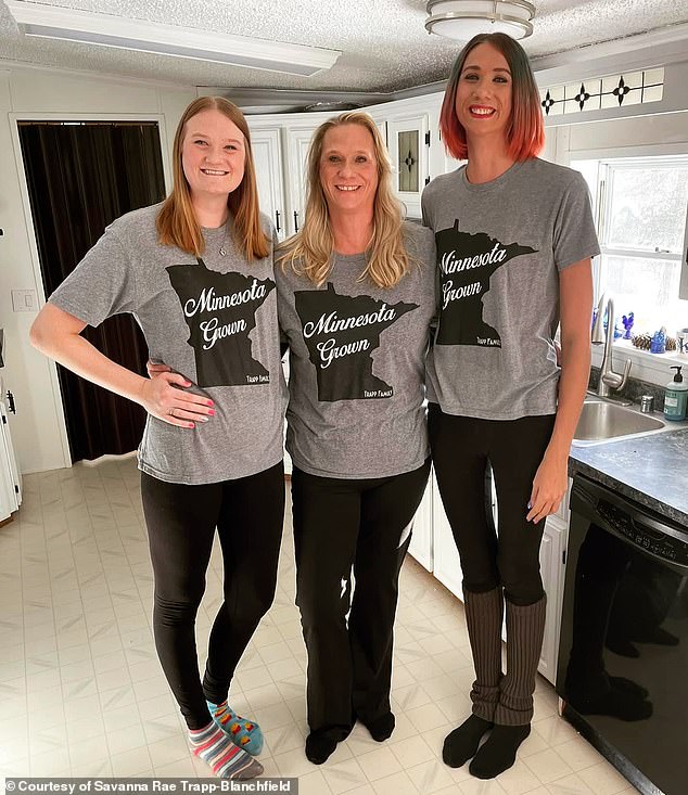 Her family was named the tallest family in the world by the Guinness World Records in 2022, with an average height of 6ft 8.03in amongst them. She's seen with her sister and mom