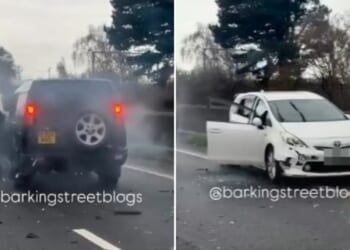 Shocking moment 'masked thugs' unleash terrifying robbery on crashed car after forcing it off M1