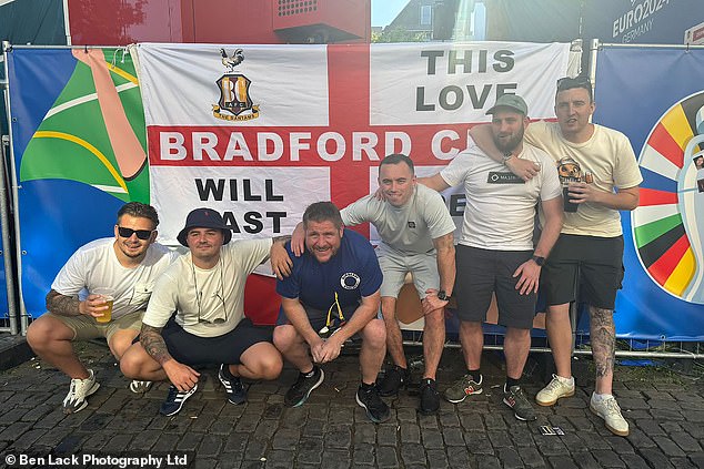 Wright (centre in blue t-shirt) previously travelled the country following his beloved Bradford City, but was handed an eight-year nationwide stadium ban in 2008 and jailed for 27 months after being caught on CCTV hurling punches at Rotherham United fans outside a Bradford pub