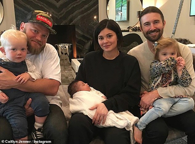 The half-siblings of Kendall and Kylie Jenner have been pictured hanging out with their famous family members but have never courted the limelight (Burt and Brandon pictured with Kylie)