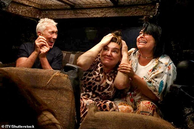 The six celebs are told they need to earn their dinner by fishing through a critter cage for keys to unlock the car as cockroaches and worms rain down on them