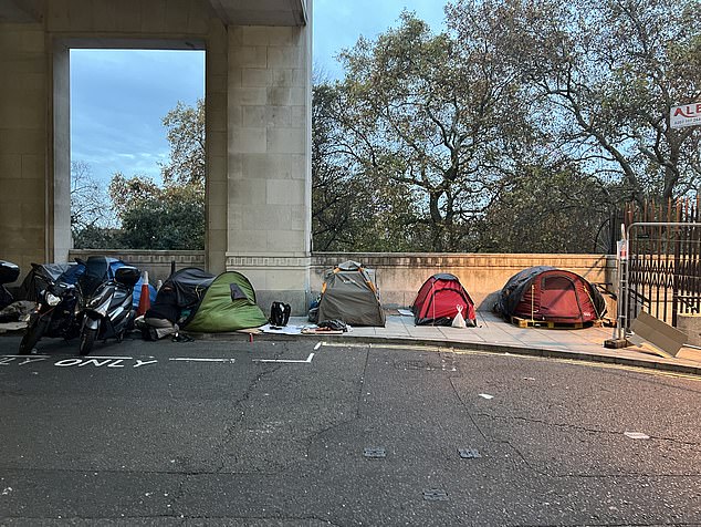 Another encampnment is tucked away behind the glistening lights of West End theatres and the Savoy Hotel in London