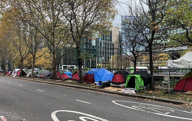 Shocking pictures taken by the Daily Mail shows a ramshackle 'village' at the end of Tottenham Court Road in central London