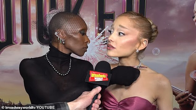 'She's getting the fixing itch that Cynthia Erivo gets,' Grande says, as Erivo twists the necklace all the way around to show the clasp, before turning it around again