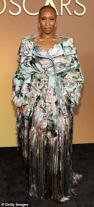 Erivo rocked a unique Givenchy coat dress with a dramatic fringe trim