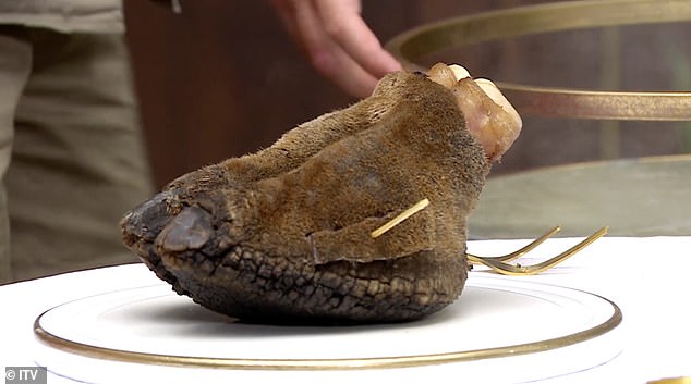 The infamous eating trial is back with a vengeance, as Ginge takes on a camel toe infused with cockroach smoke dish to win stars for camp