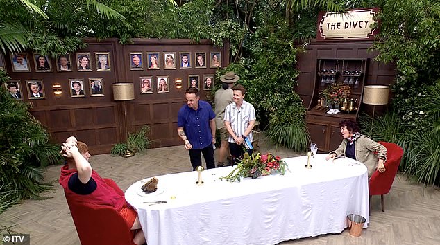 Hosts Ant and Dec were full of glee as they watched Ginge sit down and look full of disgust at the plate in front of him