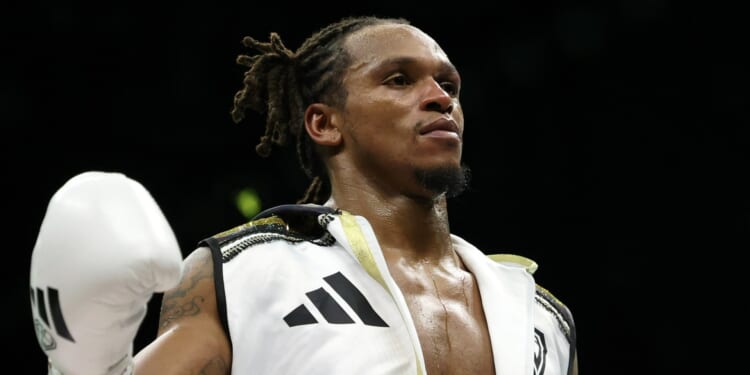 Who else is fighting with three world title bouts in store?