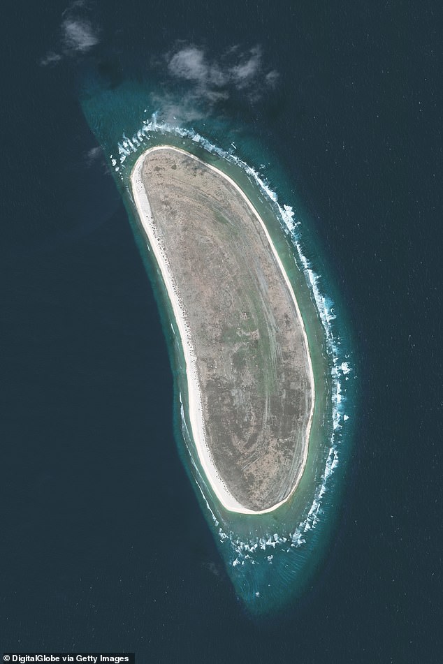 Radio transmissions revealed Earhart was running low on fuel as she approached Howland Island (pictured) in the Pacific Ocean. She called on the Coast Guard to use a ship in the area to help guide her