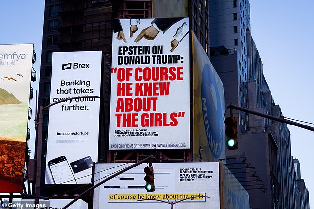 NEW YORK, NEW YORK - NOVEMBER 17: A billboard in Times Square, by the group Home of the Brave, highlights Jeffrey Epstein's comment about Donald Trump that "of course he knew about the girls.", on November 17, 2025 in New York City. President Donald Trump has now called on House Republicans to vote to release files related to Jeffrey Epstein. (Photo by Adam Gray/Getty Images)