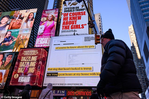 NEW YORK, NEW YORK - NOVEMBER 17: A billboard in Times Square, by the group Home of the Brave, highlights Jeffrey Epstein's comment about Donald Trump that "of course he knew about the girls.", on November 17, 2025 in New York City. President Donald Trump has now called on House Republicans to vote to release files related to Jeffrey Epstein. (Photo by Adam Gray/Getty Images)