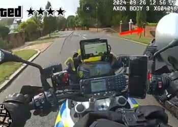 Moment moped-rider takes drastic step in bid to shake off bike cop during Grand Theft Auto-style chase