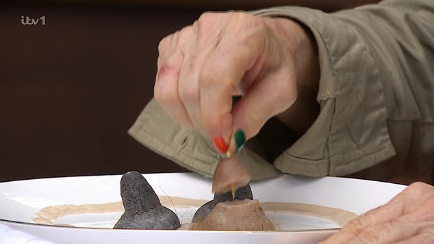 A delighted, but slightly nauseous, Ruby and Ginge returned to camp to tell their fellow celebrities they'd won 10 out of 10 stars for camp, and would be eating well that night