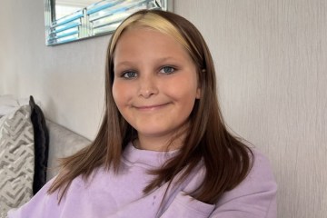 Doctors picketing outside St Thomas' Hospital with signs reading "Patients Need Doctors, Doctors Need Jobs" and "Pay Restoration for Doctors."