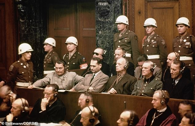 The defendants in the dock at the Nuremberg trials. Front row, from left: Hermann Goering; Rudolf Hess, deputy leader of the Nazi Party; foreign minister Joachim Von Ribbentrop; Wilhelm Keitel, armed forces High Commander, and Gestapo chief Ernst Kaltenbrunner